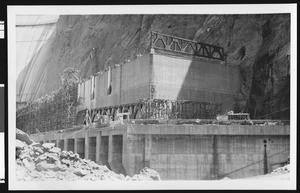 Construction of Boulder Dam, showing a concrete base, ca.1930