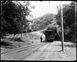 Railroad car entering the tunnel on the way to Alum Rock Park in San Jose, ca.1900