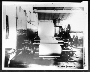 "Cotton slasher" machine in an unidentified factory