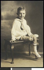 A portrait of a boy on a table