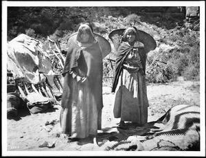 Two Havasupai Indian women with "Kathaks" on their backs, ca.1900