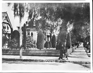 Exterior view of the Jones residence at the northwest corner of Main and Fifth Streets looking north on Main, ca.1897