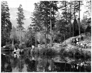 People riding in a Stella Lake Stage, operated by Washburn Stage Line, Wawona, California, 1890