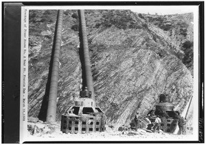 Workers surveying the wreckage of Power House number 2 near St. Francis Dam, 1928