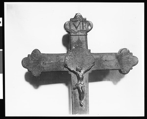 Top of brass processional cross at the Mission San Miguel Arcangel