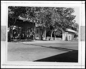 View of an unidentified street in Amador, showing the Imperial Hotel and American Mercantile Company, ca.1930