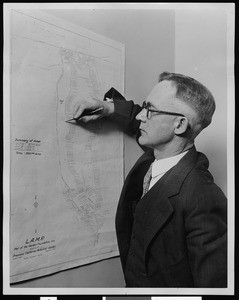 California Botanic Gardens, showing plat map being examined by Dr. Merrill