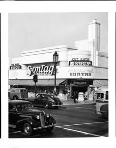 Exterior view of the Sontag Drug Store, located at the northwest corner of Wilshire Boulevard and Cloverdale Avenue, 1941