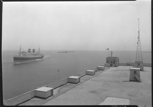 Marine Exchange rooftop and ship coming into harbor, July 1938