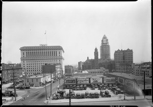 View of the Los Angeles City Garage with the civic center in the background, 1927