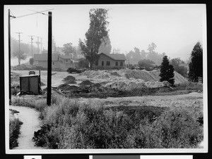 Residential area with piles of dirt