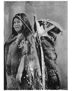 Washoe Indian woman carrying her papoose on her back, ca.1900