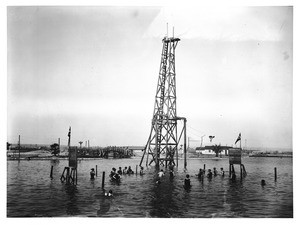 Venice diving tower, showing swimmers in the water, ca.1905