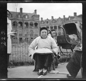 Portrait of a nurse-maid in a park in Hong Kong, ca.1900