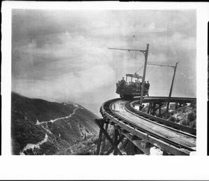 The first Mount Lowe Railway ride showing car on curved bridge, July 4, 1893