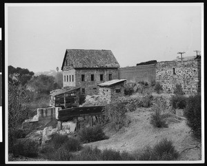 Exterior view of the old Stanislaus Flour Mill, Knight's Ferry, ca.1930