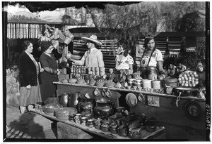 Pottery vendors at Durango Mexican Goods in El Paseo de Los Angeles, October 22, 1930