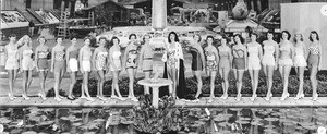 Group portrait of the Los Angeles County Fair Queen and her co-contestants at the county fair in Pomona, ca.1950-1955