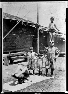 Mexican Californian clowns, or Maromeros, performing on the patio of hacienda Aguillar, 1903