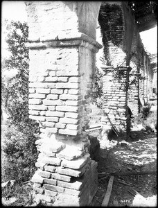 Crumbling brick pillars of the corridor at Mission San Antonio de Padua, California, ca.1906