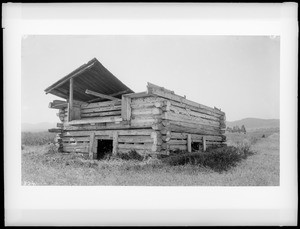 Exterior view of the ruins of the old log Fort Fremont at Monterey, 1887