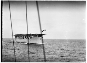 Biplane taking of from the deck of the USS Langley