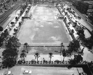 Aerial view of the construction of the Pershing Square parking garage, looking north, 1950-1959