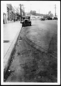 Parked automobile on Sunset Boulevard looking west toward Beaudry Avenue, ca.1920-1950