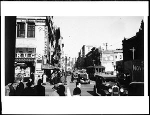 View of Hill Street looking north from the corner of Third Street in Los Angeles, December 12, 1938