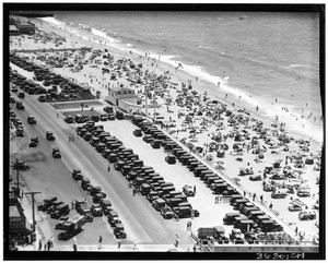 Cars parked at a beach along Pacific Coast Highway