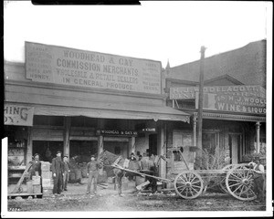 Portrait of men standing outside the Woodhead and Gay Store, Los Angeles, ca.1880