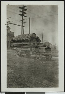 Great Western Power Company truck loaded with metal drums, ca.1910