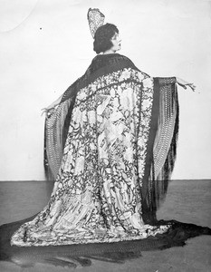 Portrait of Una Fleming modeling a shawl once owned by Lola Montez