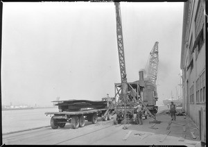 Steel plate being transported on trucks in Los Angeles Harbor, September 17, 1930