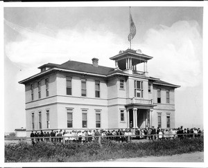 Exterior of the Huntington Beach Grammar School, showing students, ca.1905