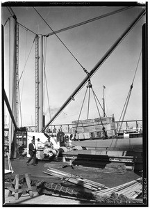 Crates of citrus being loaded onto the Annie Johnson Stockholm, Los Angeles, March 16, 1931