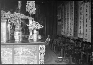 Row of chairs inside the Kong Chew Chinese Temple in Los Angeles's Chinatown, November 1, 1933