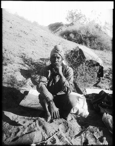 Juin, a Yuma Indian, Colorado River boatman, and interpreter, on a trip of George Wharton James on the river, ca.1900