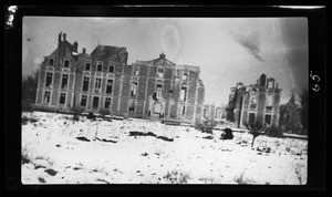 Exterior view of a badly damaged chateau in France during World War I, ca.1916