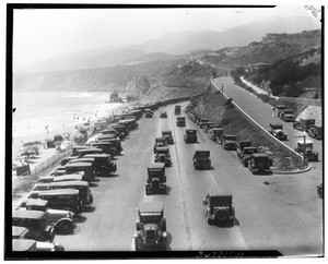 Automobiles driving on the Pacific Coast Highway