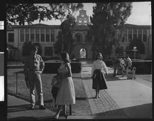 Campus scene with students in front of San Diego State College, ca.1950