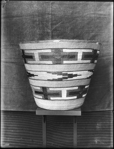 Indian basket on display, ca.1900