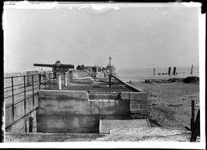 View of the mole at Zeebrugge showing the S.S. Brussels and the lighthouse, ca.1915