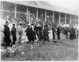 Indians watching a horse race, ca.1900