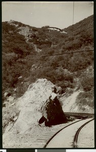 Mount Lowe Railway circular bridge, showing cars along the ciruclar track, California