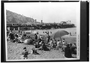 Beachgoers on the shore in Avalon, 1929