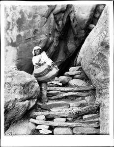 Young Acoma Indian man on the Acoma Trail, 1886