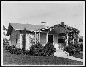 Exterior view of a rustic bungalow in Los Angeles, January 1929