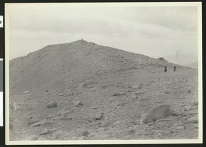 Two travellers at the base of the mound of the summit of San Gorgonio, 1900-1950