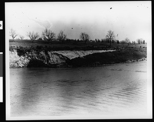 Flooded river and damaged bank, 1938